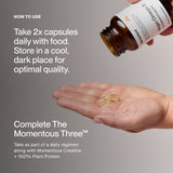 A hand holds two capsules and a Momentous Vegan Omega-3 bottle, along with instructions on dosage, storage, and daily use as part of a regimen including creatine, plant protein, and Vegan Omega-3 from Momentous.