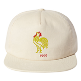 The EMB Weld Nations of Rugby France Vintage Cap is a beige brushed cotton hat featuring an embroidered rooster and "1906," capturing the essence of France's proud rugby heritage.