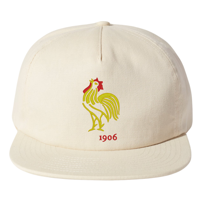 The EMB Weld Nations of Rugby France Vintage Cap is a beige brushed cotton hat featuring an embroidered rooster and "1906," capturing the essence of France's proud rugby heritage.