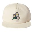 The Nations of Rugby Japan Vintage Brushed Cotton Cap by EMB Weld features embroidered white flowers with yellow centers and green stems above the number "1932.