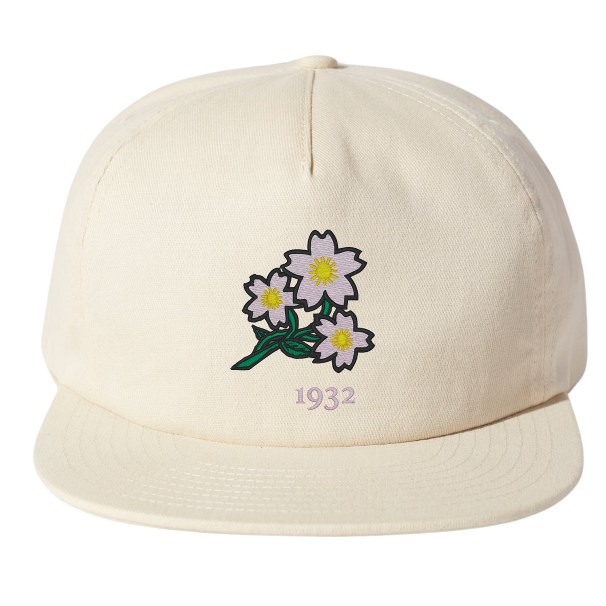 The Nations of Rugby Japan Vintage Brushed Cotton Cap by EMB Weld features embroidered white flowers with yellow centers and green stems above the number "1932.