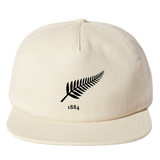 The Nations of Rugby New Zealand Vintage Brushed Cotton Cap by EMB Weld features a black fern design above "1884" on the front, part of the Classics Collection.