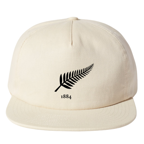 The Nations of Rugby New Zealand Vintage Brushed Cotton Cap by EMB Weld features a black fern design above "1884" on the front, part of the Classics Collection.
