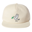 The EMB Weld Nations of Rugby Tonga Vintage Brushed Cotton Cap is crafted from brushed cotton twill in a cream color. It features a white dove graphic holding a green branch, with "1924" inscribed below, capturing the timeless spirit of the collection.
