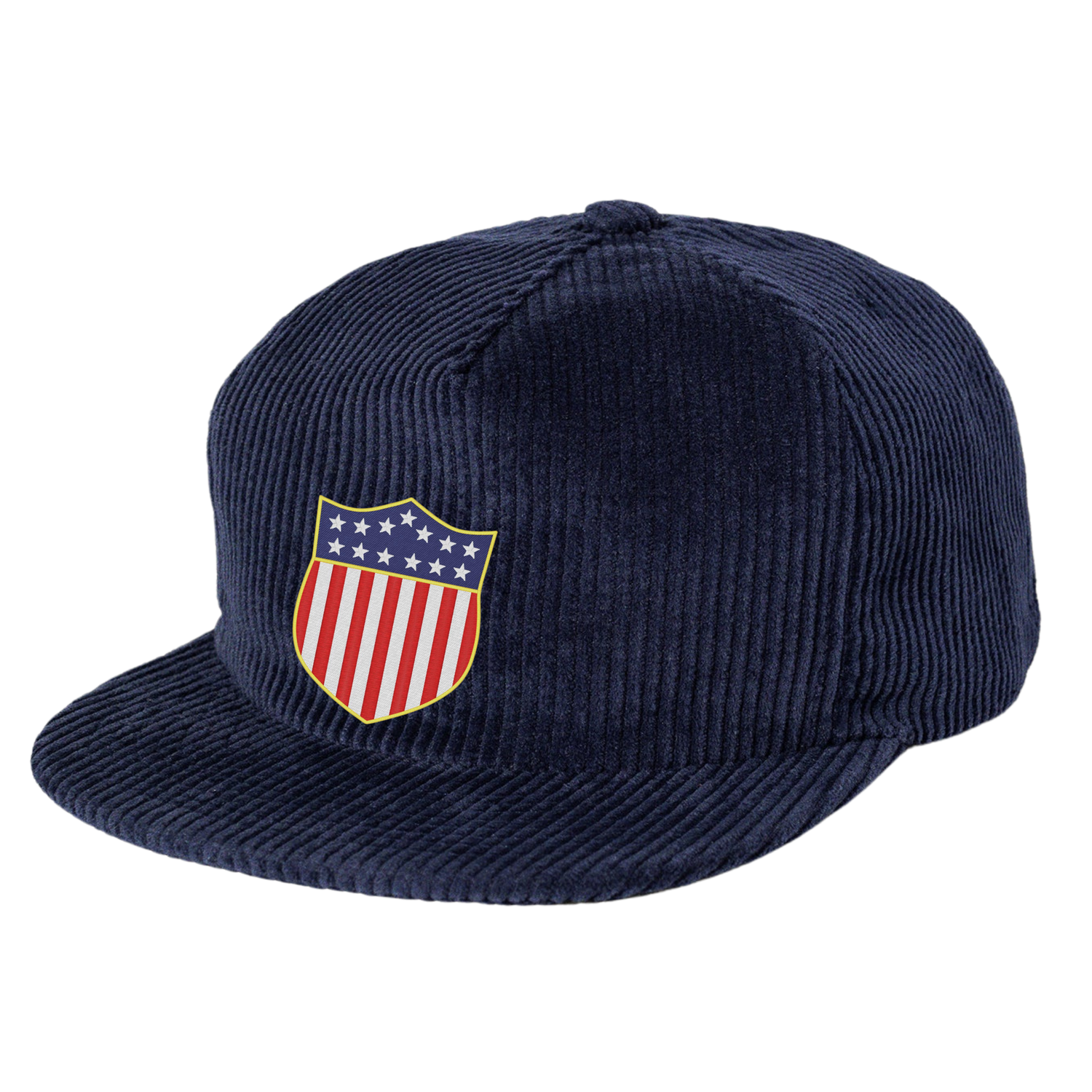 The EMB Weld USA Rugby Original Olympic Corduroy Hat is a navy blue cap with a shield-shaped American flag patch, inspired by USA Rugby heritage.