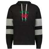 The WRS Augusta Nations of Rugby Wales Jackson Way Hoodie is a black top with grey sleeve stripes, featuring a red dragon and green "WALES RUGBY" text on the chest.
