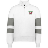The EMB Augusta Women's Nations of Rugby Wales Jackson Way Pullover is a white cropped quarter-zip fleece with grey sleeve stripes and a red dragon "Wales Rugby" logo, offering sporty style and comfort.