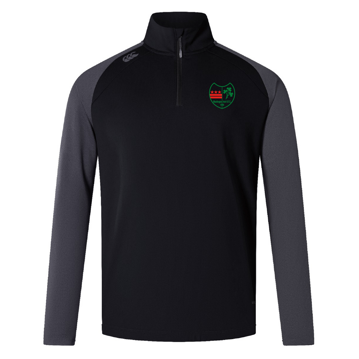 Explore the Washington Irish Rugby Elite 1/4 Zip Top by Canterbury, a black and gray long-sleeve sports top adorned with a green and red embroidered shield logo on the chest. Crafted by EMB Canterbury for performance and comfort, this top utilizes sustainable materials to enhance your workout experience responsibly.