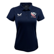 Discover the elegance of Castore Rugby Apparel with this navy blue Women's USA Rugby Polyester Polo by Castore, featuring the "Castore" and "USA Rugby" logos, a wing emblem, and a stylized rugby ball adorned with a bald eagle head.