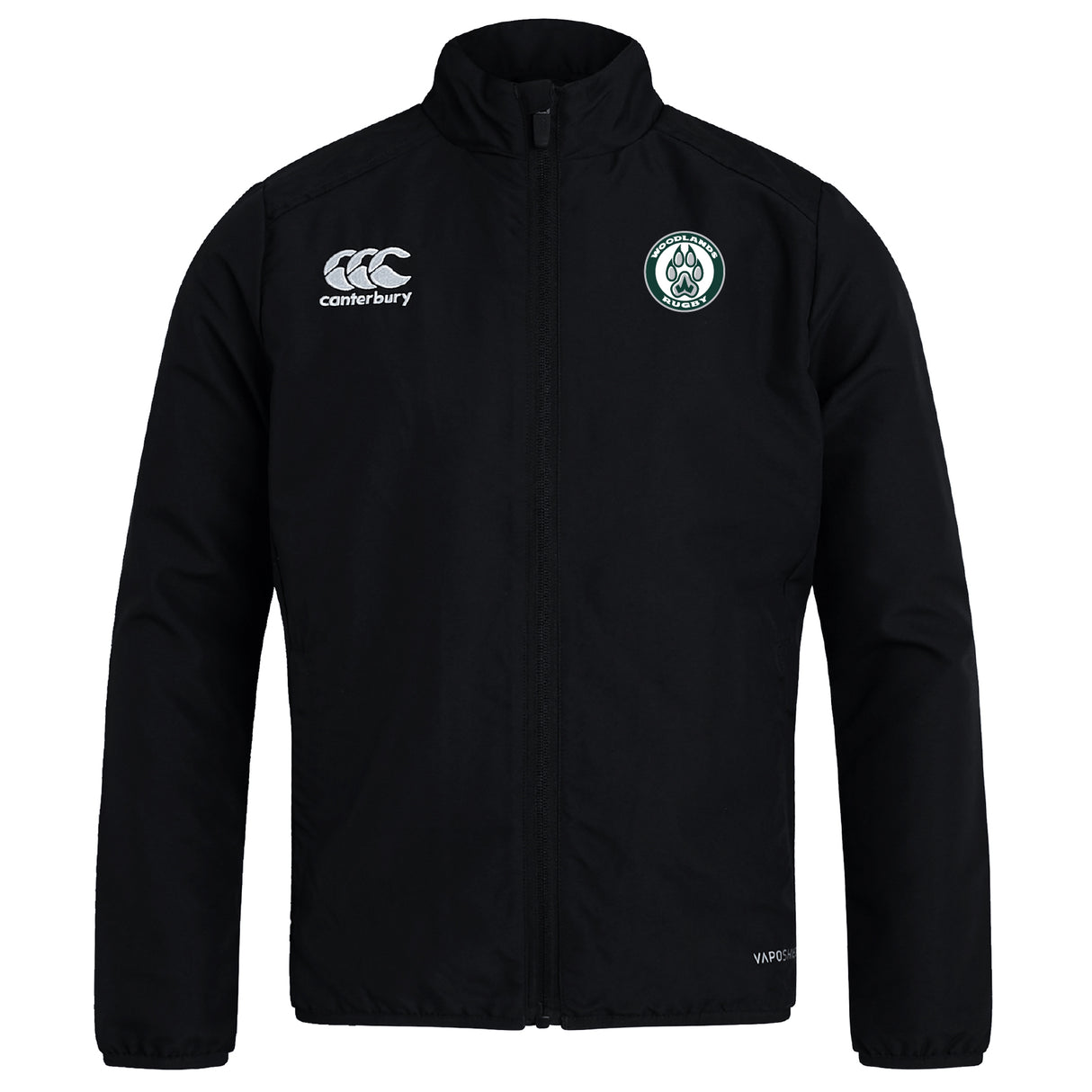 The Woodlands Youth Club Track Jacket by EMB Canterbury is a lightweight black jacket with long sleeves, featuring the Canterbury logo on the right chest and a circular green and white emblem on the left chest.