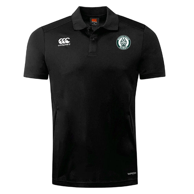 The Woodlands Youth Club Dry Polo by EMB Canterbury features a collar, button placket, and two embroidered logos. Made with Vapodri Technology, this black short-sleeve polo keeps you cool and comfortable all day.