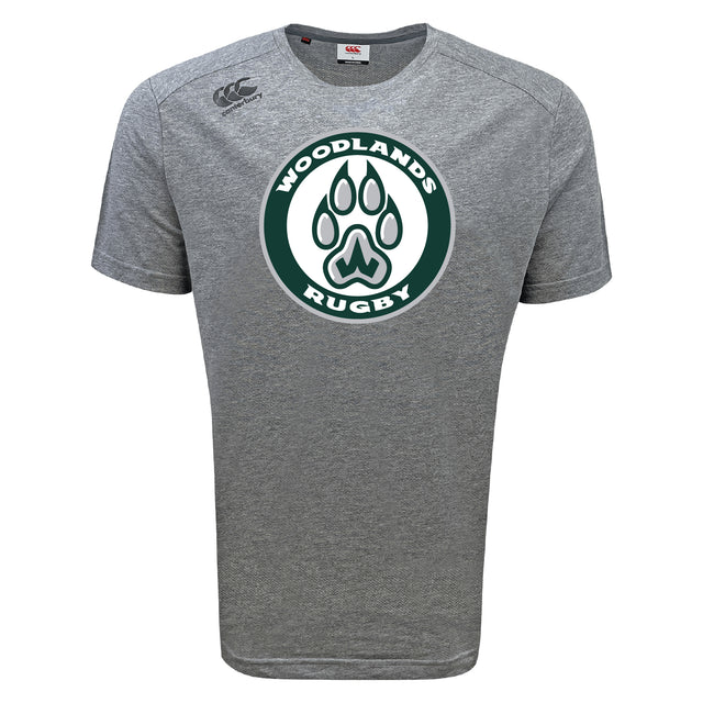 The Woodlands Youth Tempo Vapodri T-Shirt by WRS Canterbury is a gray short-sleeve tee with a large green paw print "Woodlands Rugby" logo on the chest, designed for athletic performance and moisture-wicking comfort.
