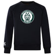 The Woodlands Youth Club Crew Sweatshirt by WRS Canterbury features an ultra-soft feel, a circular "Woodlands Rugby" logo with paw print on the chest, and an embroidered CCC logo on the left sleeve.