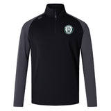 The Woodlands Youth Elite First Layer by EMB Canterbury is a black quarter-zip pullover with dark grey sleeves, featuring a circular dog logo on the left chest—perfect for rugby training.