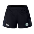 The Woodlands Youth Women's Advantage Short 2.0 by EMB Canterbury features a white Canterbury logo on the left leg and a green and white rugby club paw emblem on the right, designed for performance training as part of our sustainable sportswear range.