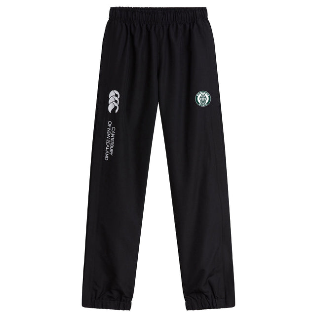 Woodlands Youth Cuffed Hem Stadium Pant by EMB Canterbury features an elastic waistband, cuffed hem, white Canterbury branding, and a circular green and white logo on the left thigh.