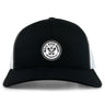 The EMB S&S Activewear White River Rugby Football Club Retro Trucker Cap features a black and white design, a circular embroidered front logo, and an adjustable snapback closure for a custom fit.