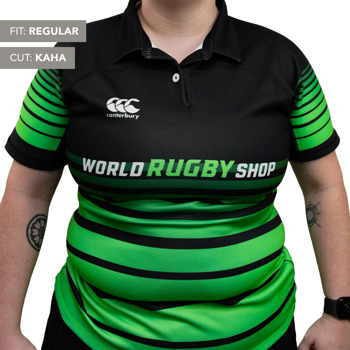 A woman wears a Teamatical Canterbury Elite Full Custom Sublimated Jersey, featuring black and green stripes, with "Fit: Regular" and "Cut: Kaha" labels.