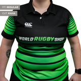A woman wears a Teamatical Canterbury Elite Full Custom Sublimated Jersey, featuring black and green stripes, with "Fit: Regular" and "Cut: Kaha" labels.