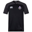 The Capitals Rugby NC Vapodri Evader Jersey by EMB Canterbury is a black short-sleeve jersey with moisture-wicking tech, Canterbury logo on the right chest, and a purple "Capitals" logo on the left.