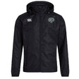 The Woodlands Youth Wolfpack Club Vaposhield Stadium Jacket by EMB Canterbury is black, with padded insulation, a white "Canterbury" logo on the right chest, and a green and white wolf crest on the left.