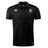 The Capitals Rugby NC Club Dry Polo by EMB Canterbury is a black short-sleeve polo with Vapodri Technology, featuring the Canterbury logo on the right chest and a purple Capitals team crest on the left.