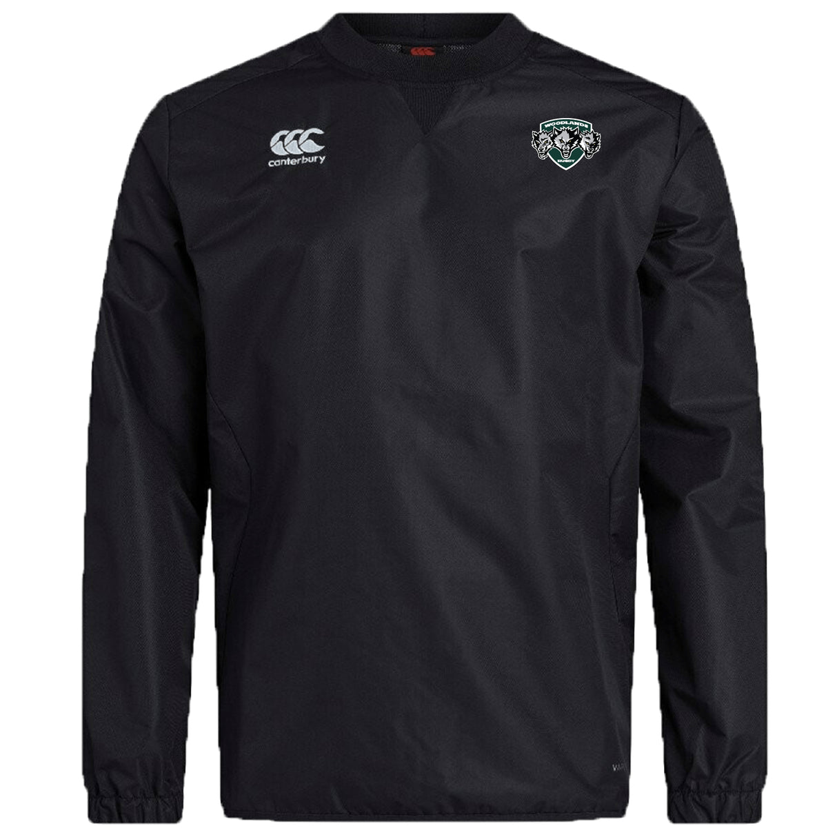 The EMB Canterbury Woodlands Youth Wolfpack Club Vaposhield Contact Top features a black, long-sleeve design with the Canterbury logo on the right chest, green and white team crest on the left, and water-resistant Vaposhield technology.