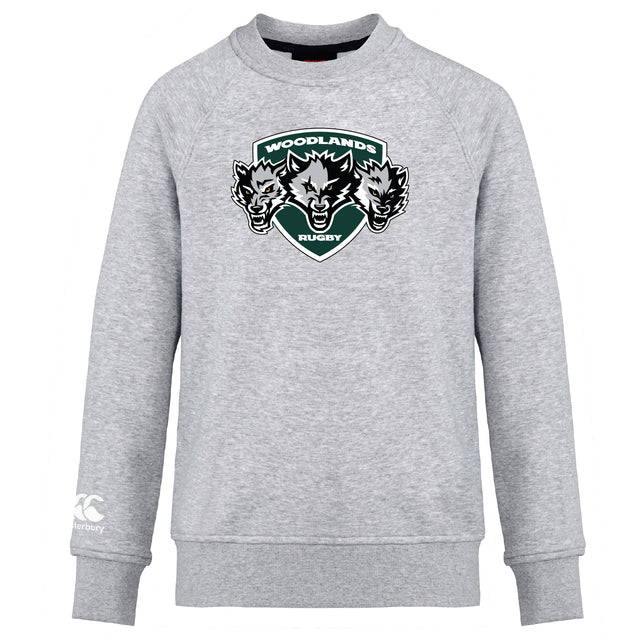 The Woodlands Youth Wolfpack Club Crew Sweatshirt by WRS Canterbury is an ultra soft, light gray crew with the embroidered "Woodlands Rugby" three-wolf-head logo on the chest and a small white Canterbury logo on the left sleeve.