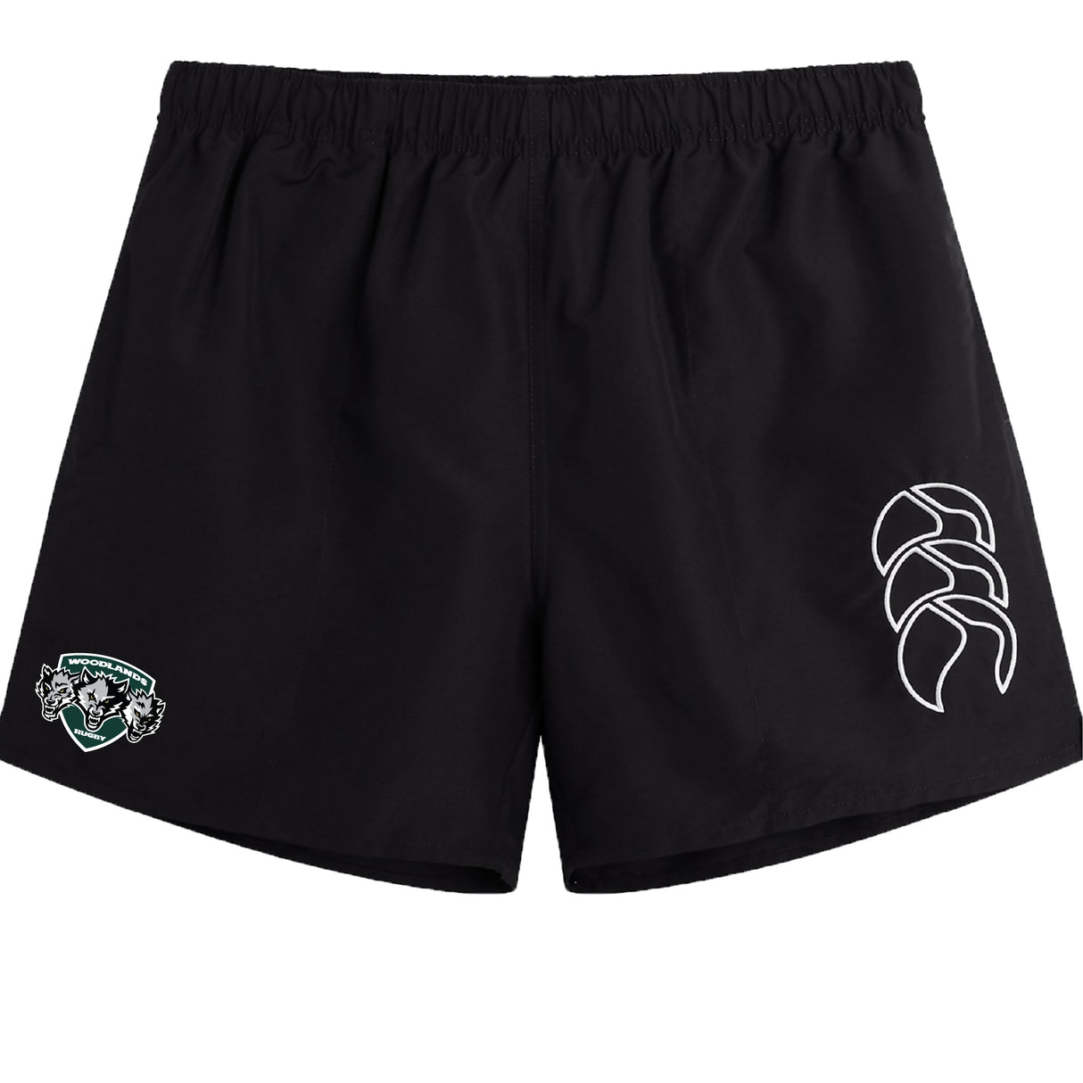 The Woodlands Youth Wolfpack Tactic Short by EMB Canterbury features a black design with an elastic waistband, white Canterbury logo on the right leg, and a green/white patch on the left—ideal for youth rugby or training.