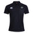 The Woodlands Youth Wolfpack Waimak Polo by EMB Canterbury is a classic black short-sleeve polo with a collar, featuring a white Canterbury logo and a small chest emblem.