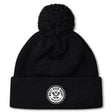 The White River Rugby Football Club Pom Pom Beanie by EMB Canterbury features a black knit design, a pom-pom top, and a round white front patch for classic style.