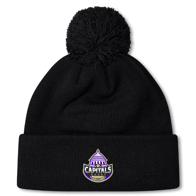 Stay warm with the Capitals Rugby NC Pom Pom Beanie by EMB Canterbury, featuring fleece lining, a pom-pom top, and an embroidered Washington Capitals logo on the front cuff.