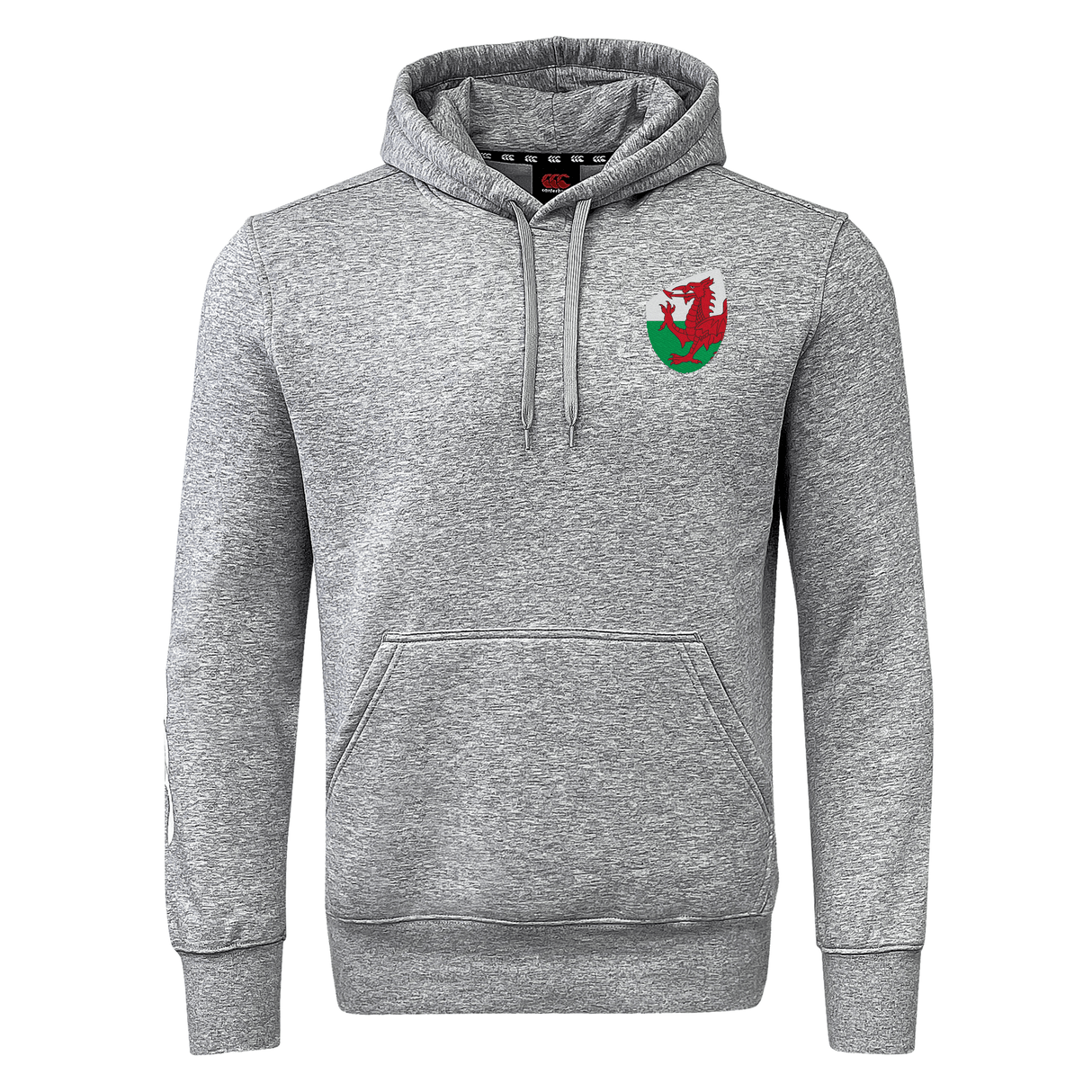 The EMB Canterbury Wales Shield Club Hoodie is made from premium sweatshirt fleece, features a front pocket, and displays a small red and green dragon emblem on the left chest. It's perfect for rugby supporters seeking comfort and style.