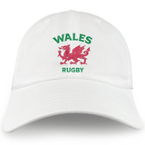 An EMB Alpha Broder white cotton twill Nations of Rugby Wales Dad Cap with an embroidered design of the Welsh rugby spirit.