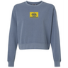 Berkeley RFC Women’s Garment-Dyed Mid-Length Crewneck Sweatshirt in blue, featuring a rectangular yellow chest patch with a blue bear icon and “Berkeley RFC Est. 2006” text.