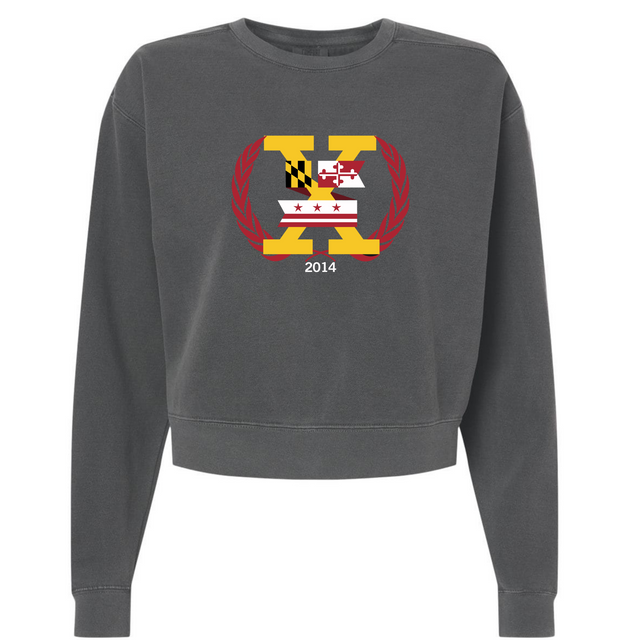 Introducing the Potomac Exiles Rugby Club Women's Garment-Dyed Mid-Length Crewneck Sweatshirt by EMB S&S Activewear—a dark gray, heavyweight fleece top featuring a large "X" logo on the chest. The design incorporates elements of the Maryland and Washington, DC flags, laurel branches, and displays "2014" beneath the graphic. This mid-length crewneck offers lasting comfort and distinctive style.