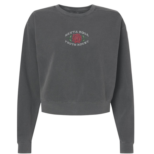 The Santa Rosa Youth Rugby Women’s Garment-Dyed Mid-Length Crewneck Sweatshirt by EMB S&S Activewear features a charcoal gray design with “Santa Rosa Youth Rugby” and a red rose graphic printed on the chest. Made from heavyweight fleece, this crewneck provides both comfort and style for women.