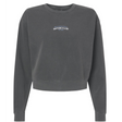 The EMB S&S Activewear South Orange County Raptors Women’s Garment-Dyed Mid-Length Crewneck Sweatshirt comes in a dark gray hue and features small white chest text stating, “Raptors Playby Est. 1995.” Made from heavyweight fleece, this relaxed-fit sweatshirt includes ribbed cuffs for enduring comfort and style.