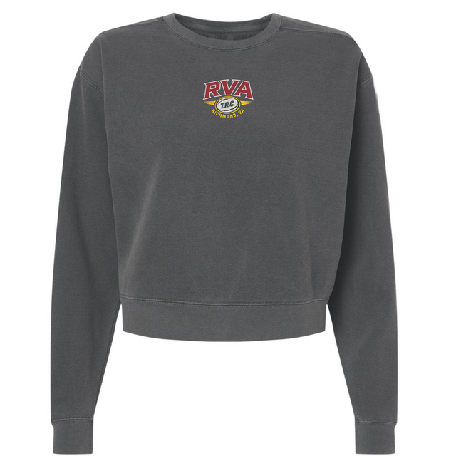The RVA T.R.C. Women’s Garment-Dyed Mid-Length Crewneck Sweatshirt by EMB S&S Activewear is a dark gray heavyweight fleece featuring long sleeves and a small “RVA TRG RICHMOND” logo in red, yellow, and white on the chest.