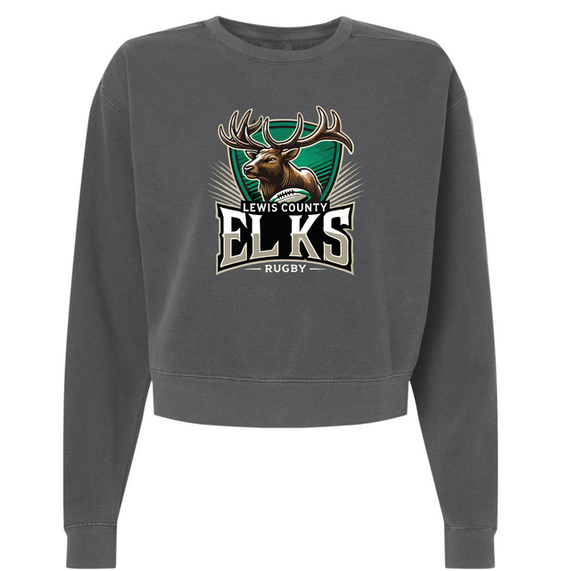 The EMB S&S Activewear Lewis County Elks Women’s Garment-Dyed Mid-Length Crewneck Sweatshirt features a dark gray, heavyweight fleece construction with a mid-length, cropped silhouette. This comfortable and stylish crewneck showcases an elk graphic and “Lewis County Elks Rugby” printed on the front.