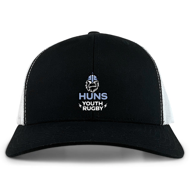 The Austin Huns Youth Rugby Retro Trucker Cap by EMB S&S Activewear features an embroidered helmeted face and "Huns Youth Rugby" on the front, with a black and white design and adjustable snapback closure for a classic fit.
