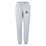 The Austin Huns Youth Rugby Women's Leisure Sweatpant by EMB Canterbury features light gray fabric, a drawstring waist, elastic cuffs, and a "Huns Hockey" logo on the left thigh—ideal sporty comfort inspired by classic Canterbury style.