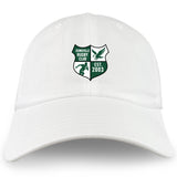 The Zionsville Rugby Club Adult Low-Profile Cotton Twill Dad Cap by EMB S&S Activewear showcases embroidered team branding with a green shield, rugby player, eagle, and "EST. 2003" on white cotton twill.
