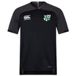 The EMB Canterbury Zionsville Rugby Club Vapodri Evader Jersey features short sleeves, a white Canterbury logo on the right chest, a green and white club crest on the left, and moisture-wicking fabric for comfort.