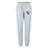 The Zionsville Rugby Club Women's Leisure Sweatpant by EMB Canterbury features a light gray organic cotton design, drawstring waist, green and white crest on the left thigh, and a white emblem on the right—ideal for rugby fans or casual wear.
