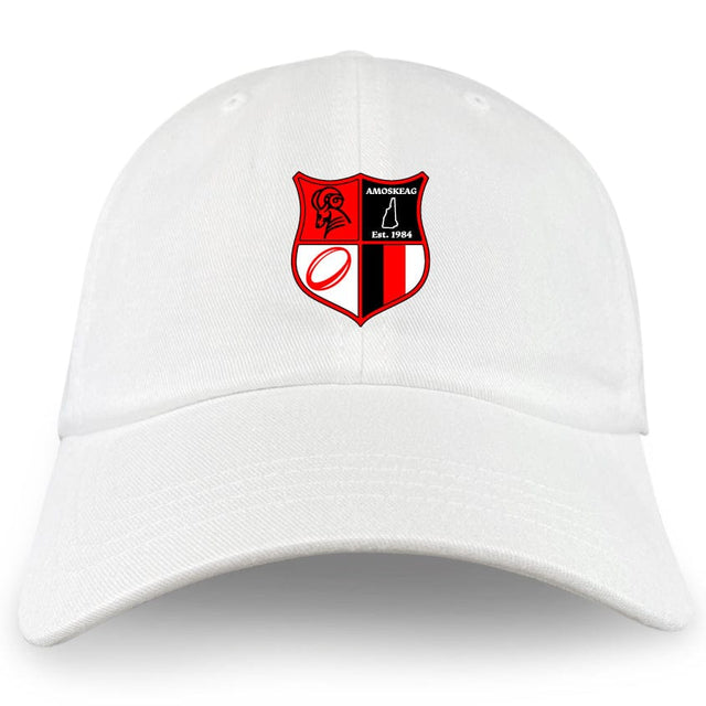 The Amoskeag Rugby Club Adult Low-Profile Cotton Twill Dad Cap by EMB S&S Activewear features a white cotton twill design with an embroidered red and black shield crest and "AMOSKEAG Est. 1984" on the front.