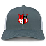 The Amoskeag Rugby Club Retro Trucker Cap by EMB S&S Activewear features an embroidered shield logo with red, black, and white symbols plus "AMOSKEAG Est. 1984" on the front and has a snapback closure for adjustable fit.