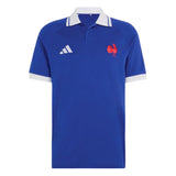 Show your support for the French Rugby Federation with the France FFR 26/27 Travel Polo by adidas—a blue, short-sleeve polo featuring a crisp white collar and cuffs, an embroidered white adidas logo on the right chest, and a bold red rooster emblem on the left chest. This official design is perfect for fans seeking classic rugby-inspired style from adidas.