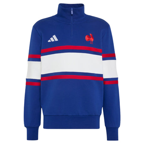 The France FFR 26/27 Travel 1/4 Zip Sweatshirt by adidas features a blue design with white and red horizontal stripes, accented by the iconic adidas logo and a red rooster emblem on the chest—a classic sweatshirt inspired by France Rugby style.