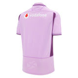 The Scotland 25/26 Replica Away Jersey by Macron features light purple with dark purple side panels, short sleeves, the Vodafone logo near the collar, and authentic Macron detailing—a must-have for dedicated Scotland Rugby fans.